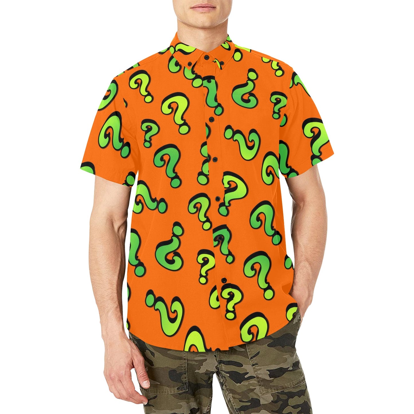 Person wearing an orange shirt with green question mark pattern
