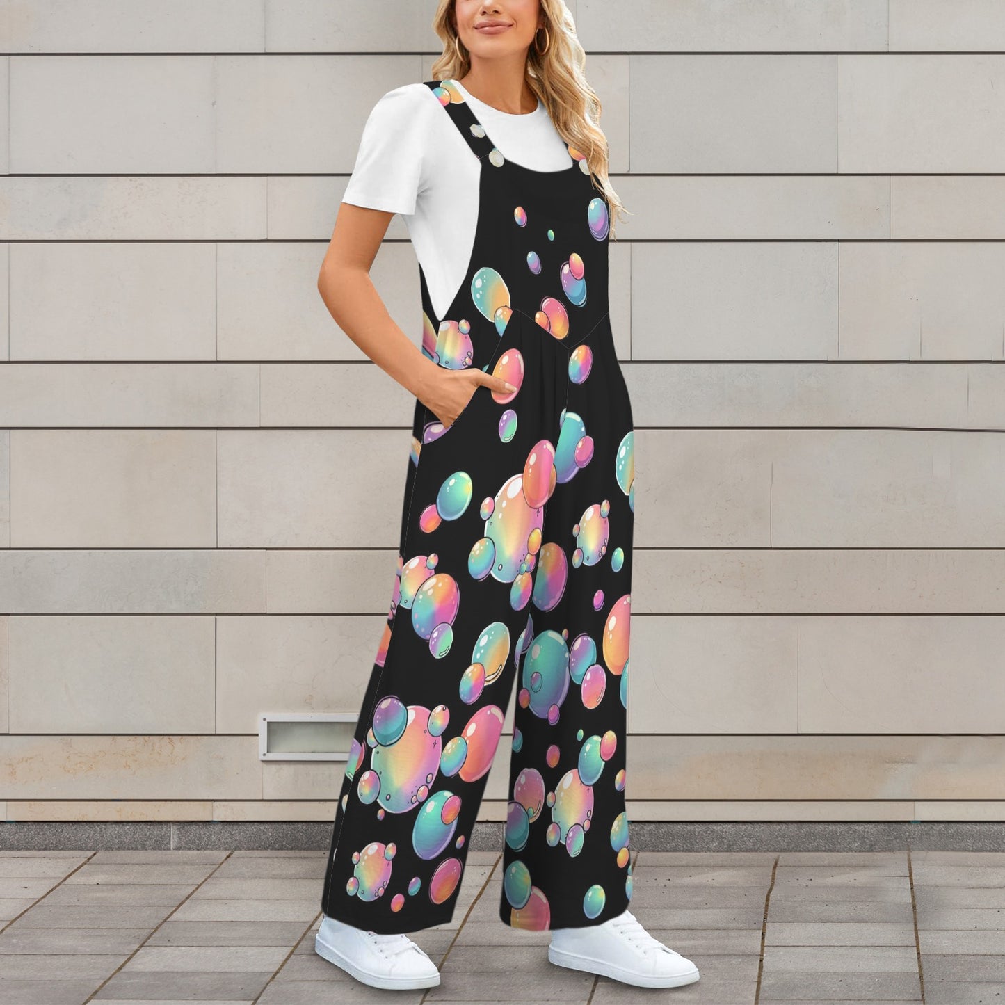Black wide leg overalls with pockets and pastel rainbow bubble design