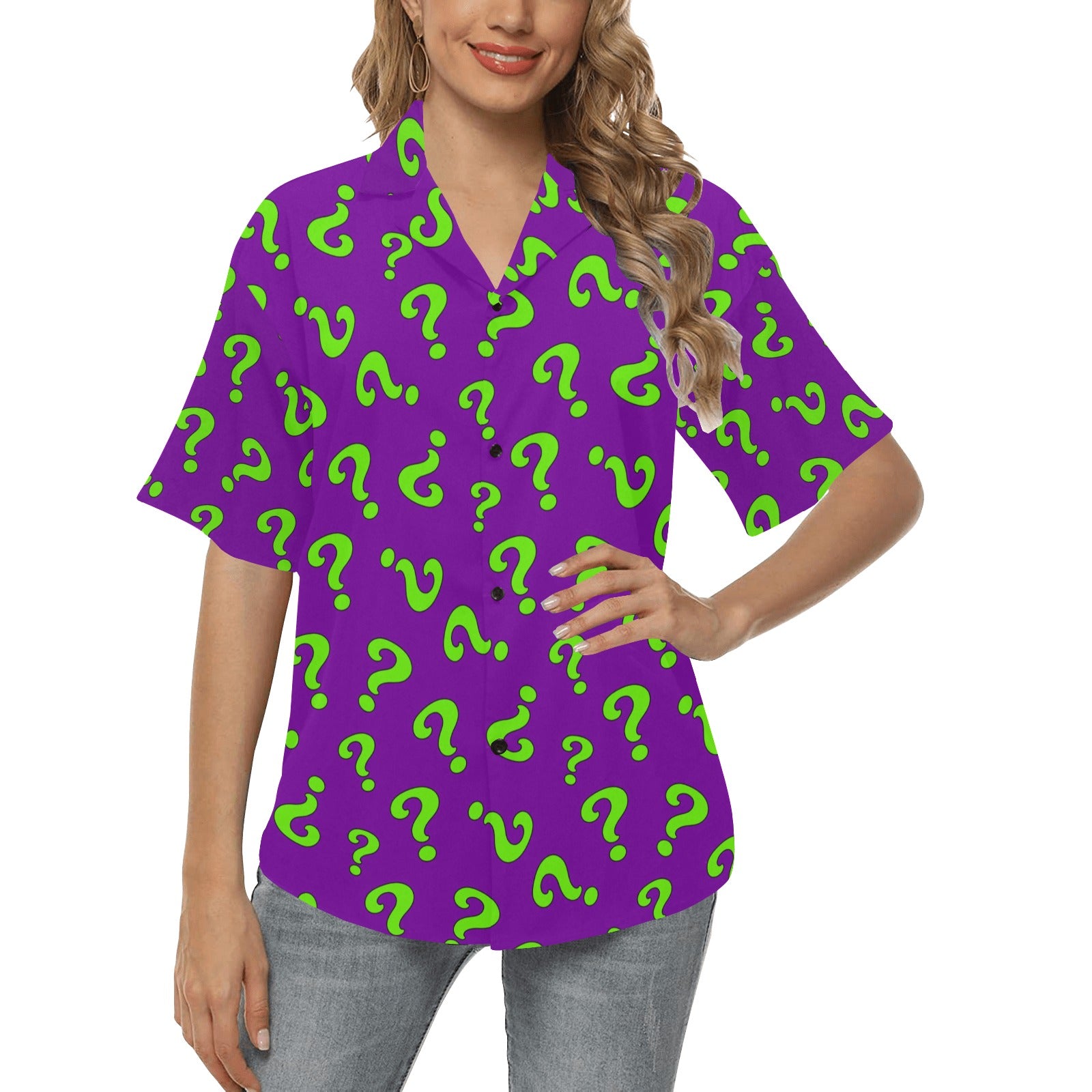 Woman wearing a purple shirt with green question mark pattern on a white background