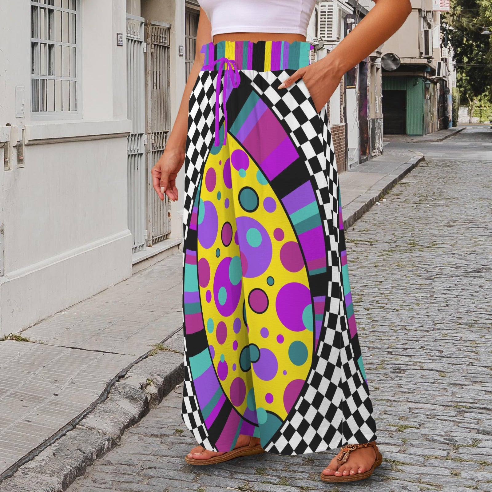 Colourful Clowning patterned pants being worn on a street.