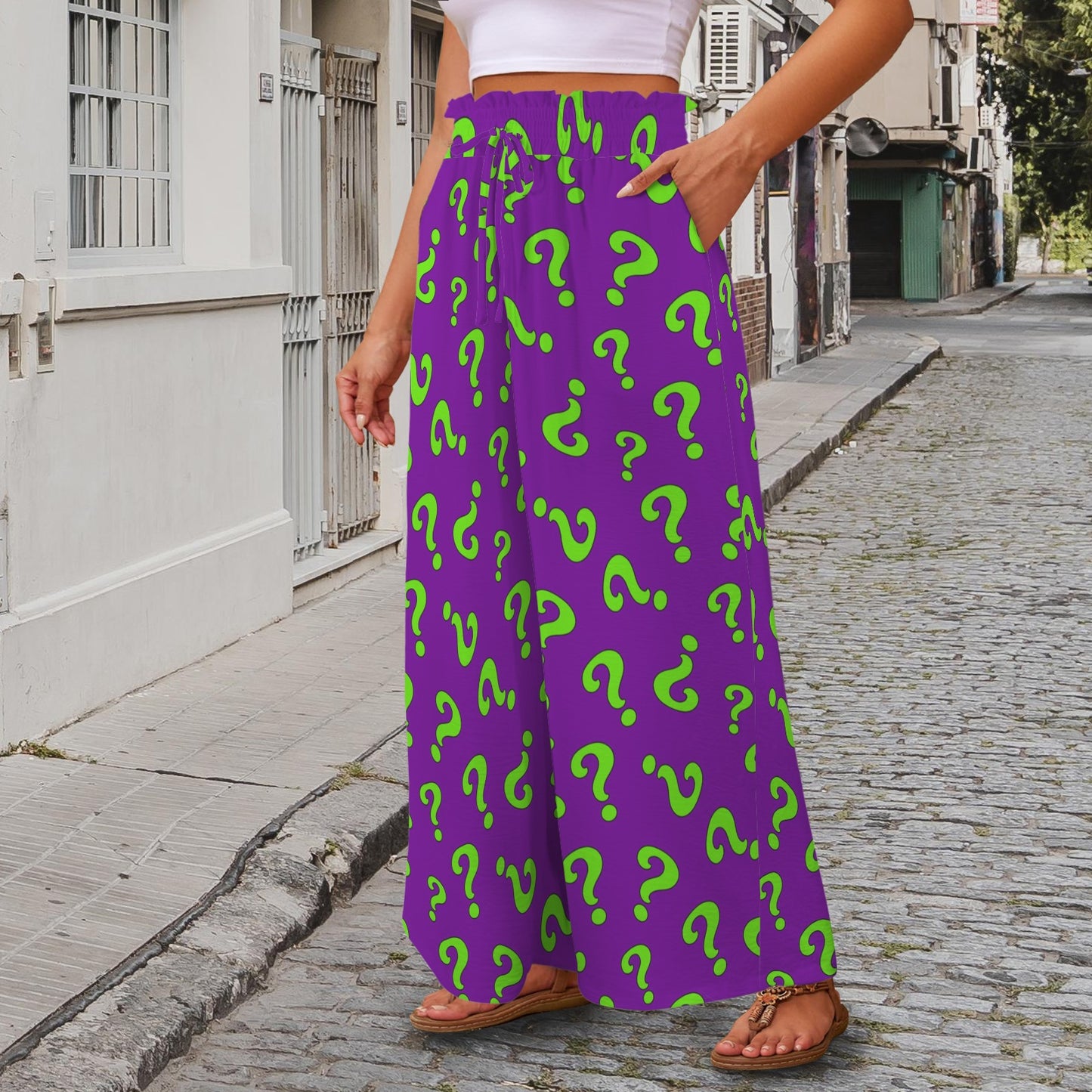 Purple pants with green question marks worn by magician on the street