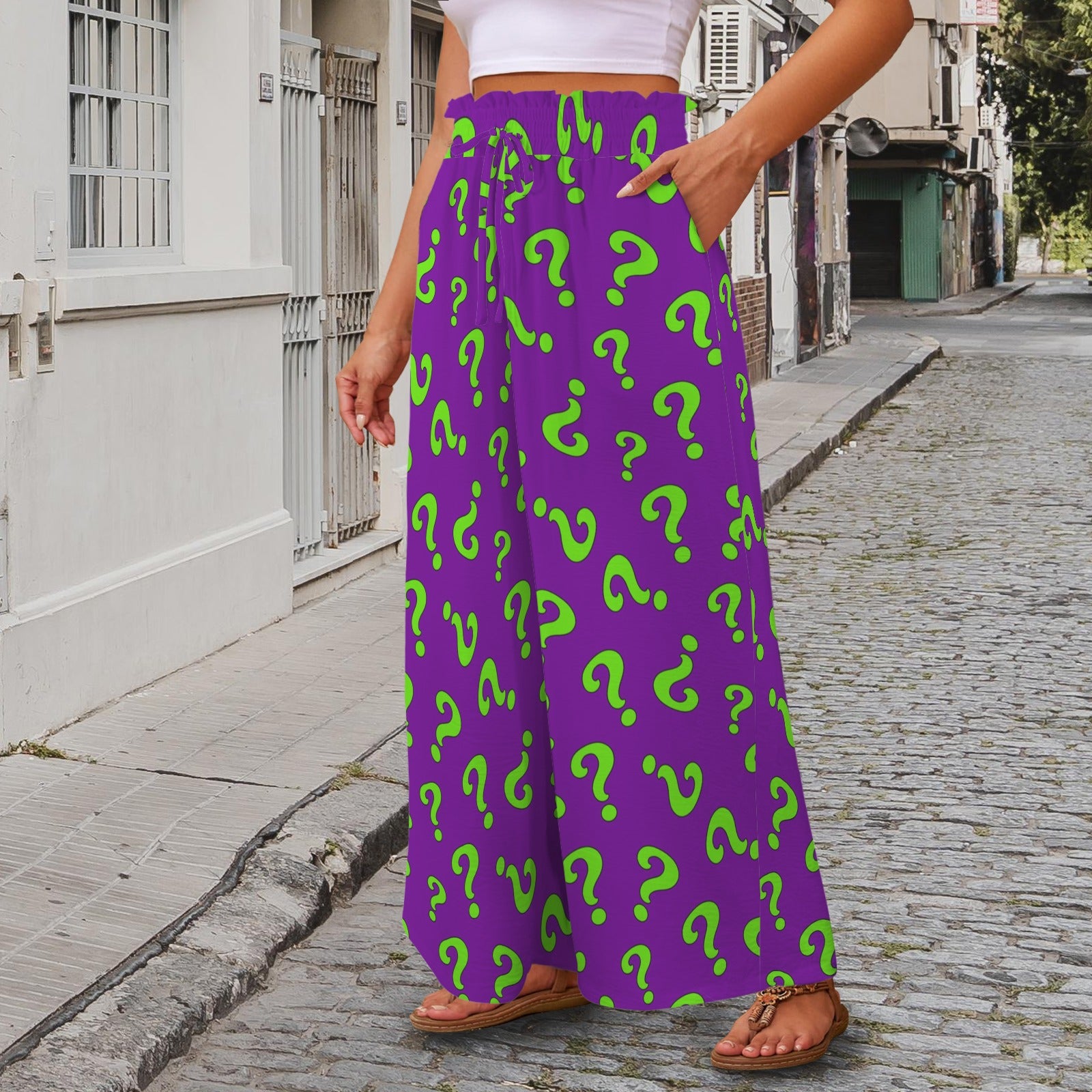 Purple pants with green question marks worn by magician on the street