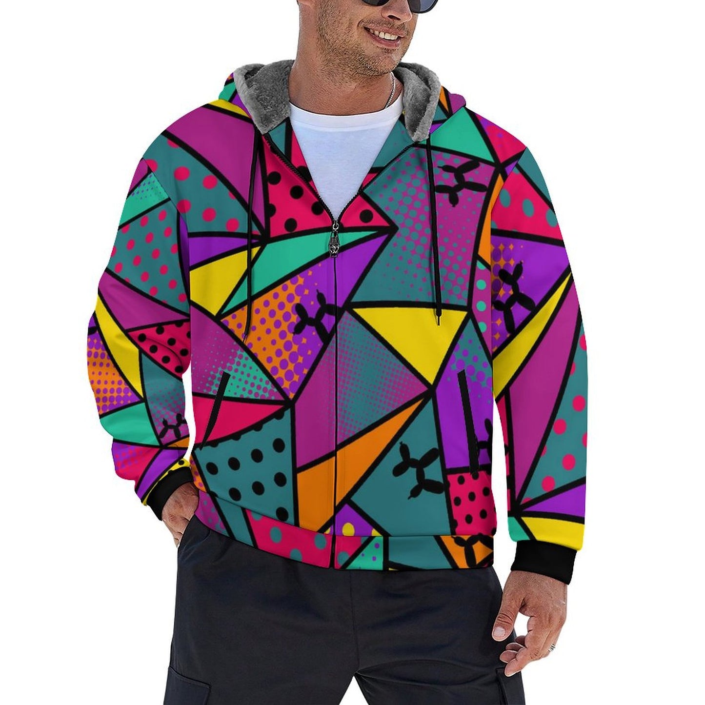 Balloon twister wearing a colourful geometric patterned hoodie with balloon dogs