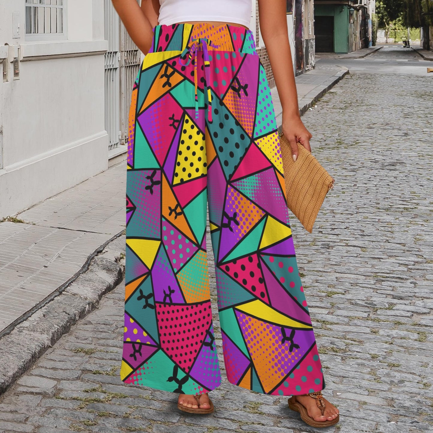 Amazing pants for balloon twisting with colourful geometric pattern and balloon dogs
