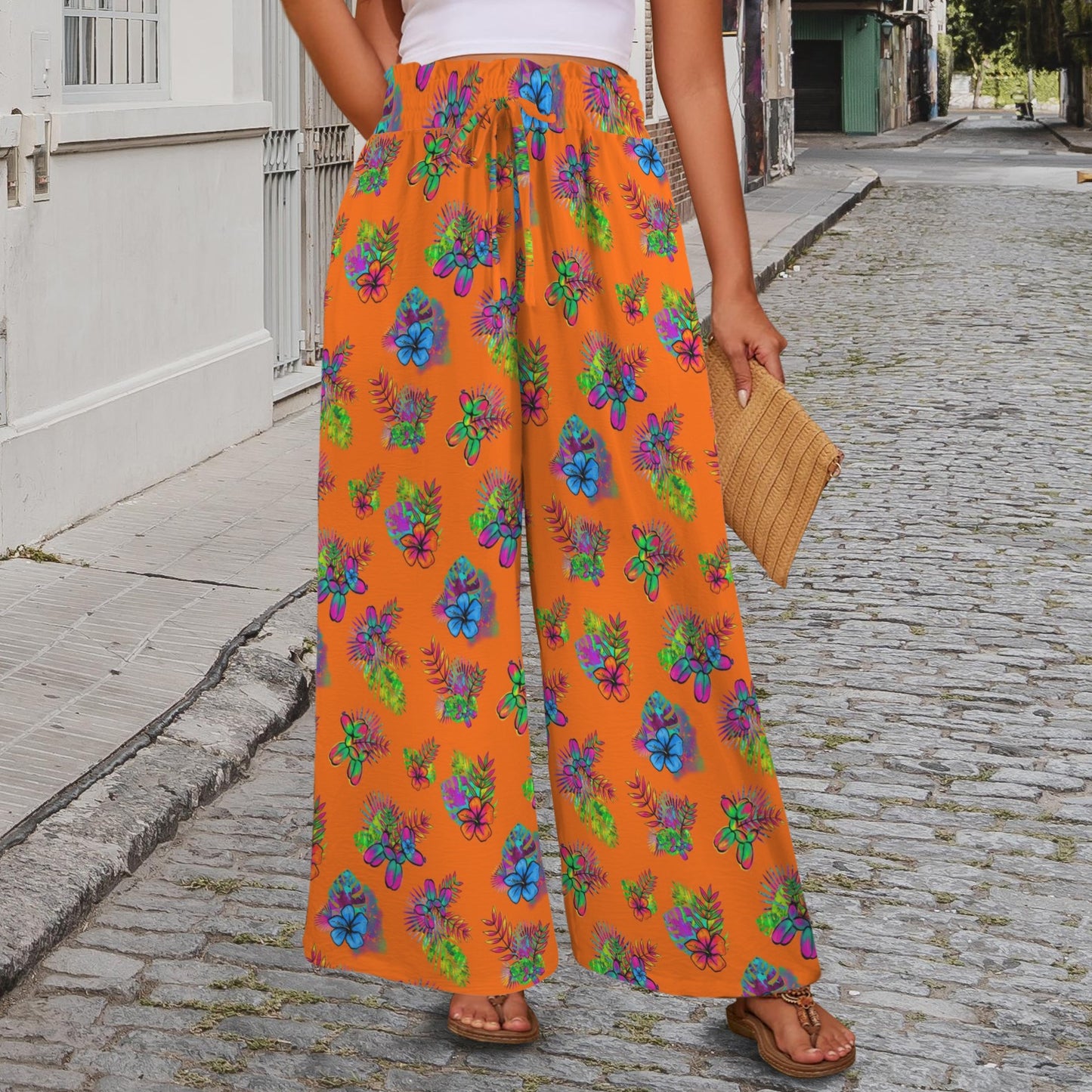 Bright orange floral balloon twisting pants for balloon artists and entertainers