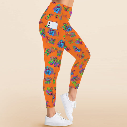 Orange leggings with tropical balloon dogs and flowers