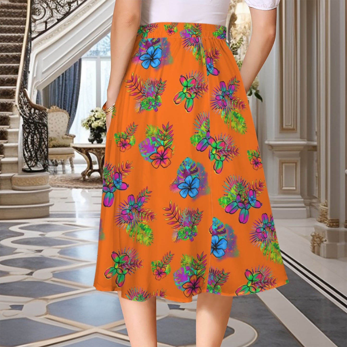 Orange skirt with tropical flowers and balloon dogs