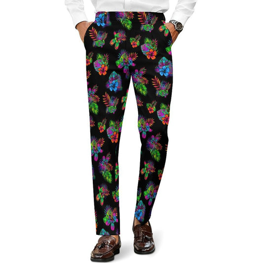 Men's slim-fit trousers with a vibrant multicolor tropical floral, leaf and Balloon Dog print on a black background, styled with a white shirt and brown loafers. Perfect for Balloon Twisters and Kids Entertainers