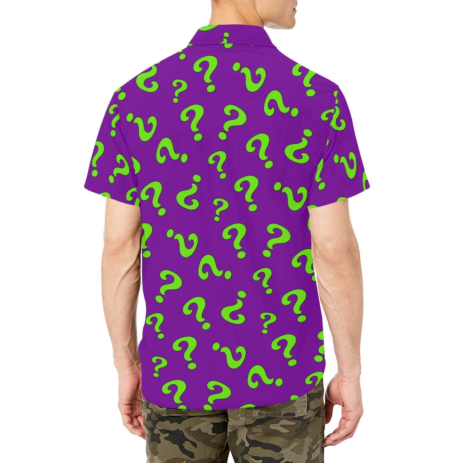 Purple shirt with green question marks worn by a person on a white background