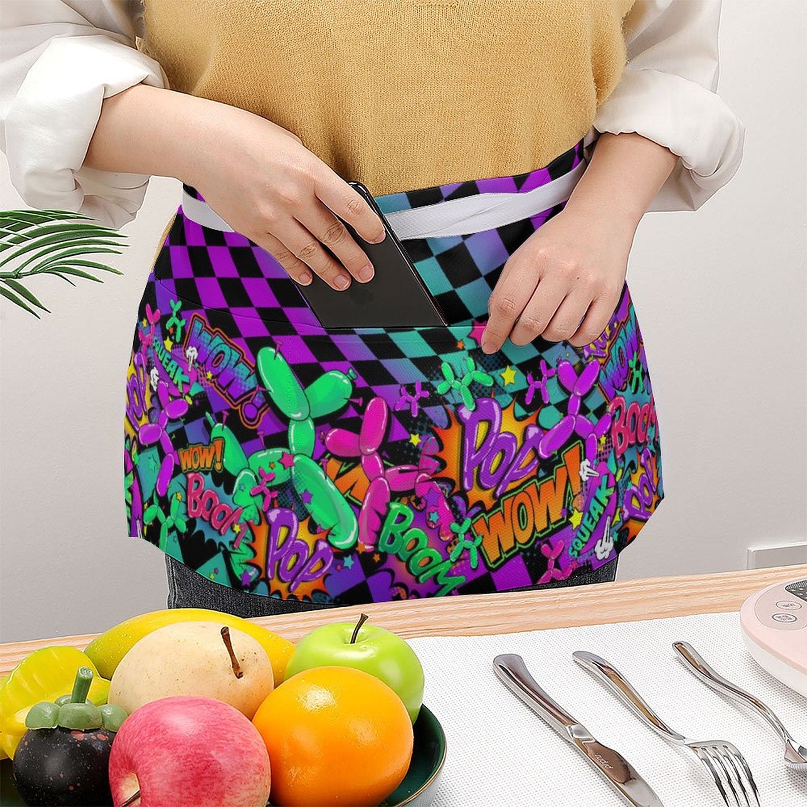 Bright and colourful apron for face painters and balloon artists