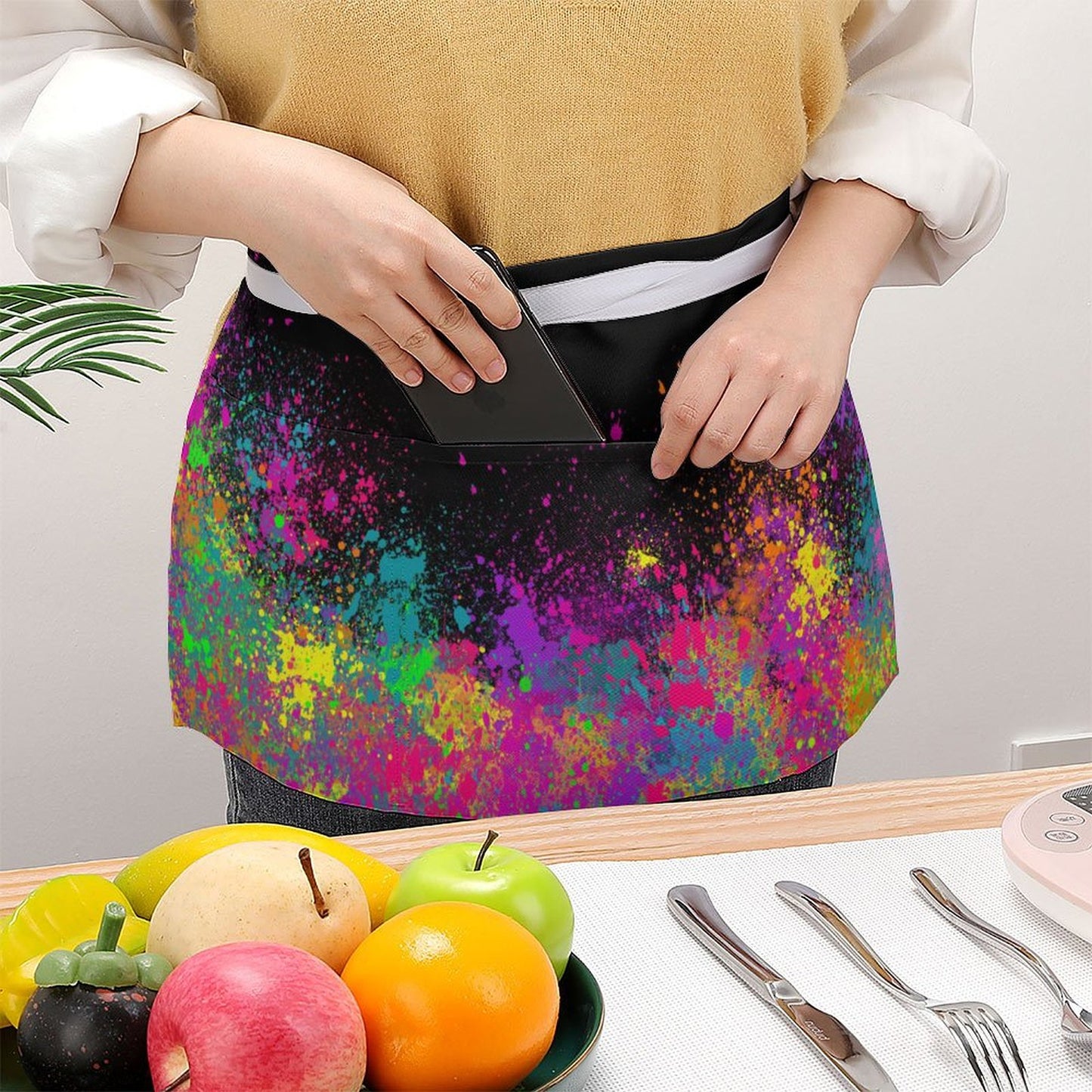 Colourful paint splatter apron for face painters and bubble artists